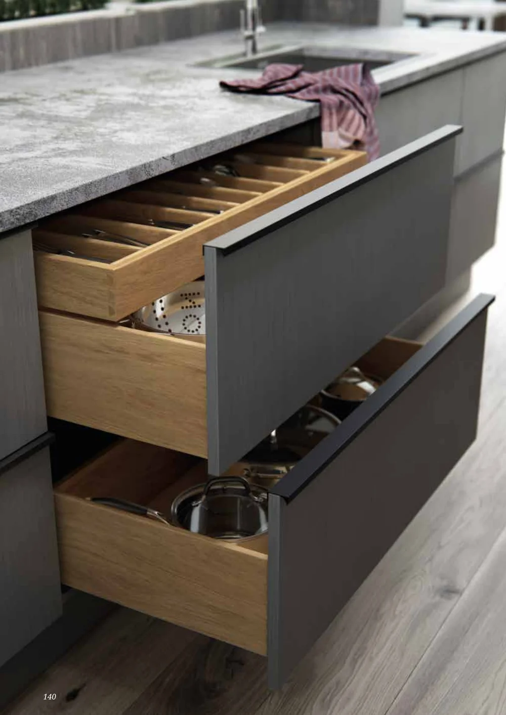 Cleverly organised pan drawers with oak inserts